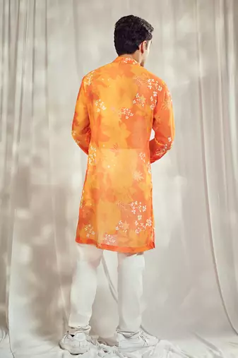 Yellow and orange floral print kurta.