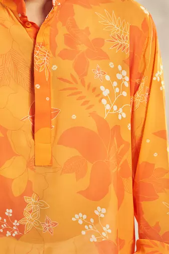 Yellow and orange floral print kurta.