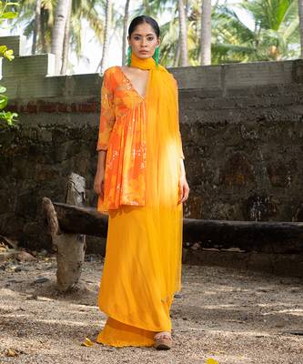 Yellow orange embroidered peplum kurti pant with dupatta 1