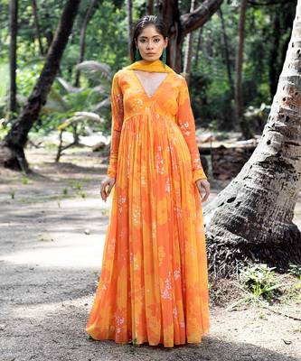 Yellow orange printed scallop embroidered anarkali with matching net scallop embroidered dupatta. 1
