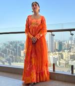 Yellow orange self scallop anarkali with matching net scallop embroidered and sequin chinta on dupatta.