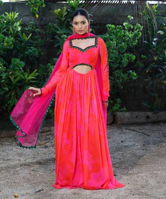 Pink red embroidered anarkali with green work and cut-out on the waist in the front and embroidered net dupatta. 1