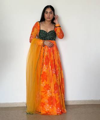 Yellow orange embroidered anarkali with green work and scallop embroidered net dupatta. 1