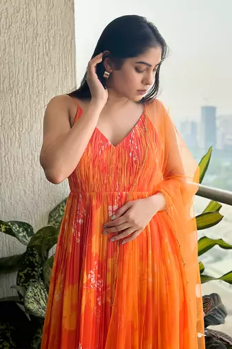 Yellow orange printed strappy ruched anarkali with matching scallop embroidered net dupatta.