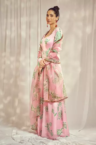 Baby pink print self scallop anarkali with matching organza silk dupatta with gold trimming lace detailing.