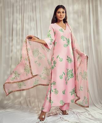 Baby pink print kurti set paired with matching bottom and star organdie dupatta with gold trimming lace detailing. 1