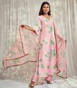 Baby pink print kurti set paired with matching bottom and star organdie dupatta with gold trimming lace detailing.