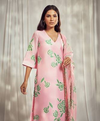 Baby pink print kurti set paired with matching bottom and star organdie dupatta with gold trimming lace detailing. 2