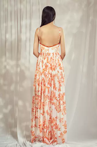 Burnt orange print strappy anarkali with lace detailing paired with matching organza silk dupatta with lace detail.
