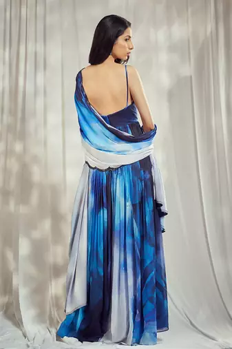 Blue print chiffon strappy anarkali with matching blue crepe dupatta with scallop embroidery border.