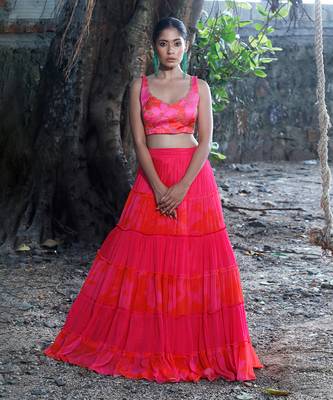 Pink and orange embroidered blouse with matching tiered lehenga 1