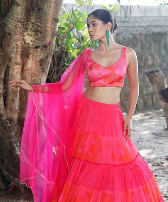 Pink and orange embroidered blouse with matching tiered lehenga 2