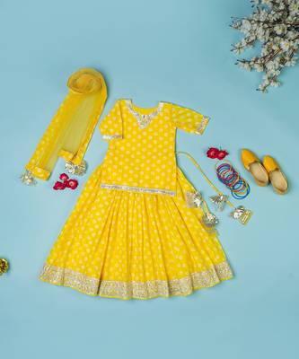 yellow bandhej lehenga for girls 1