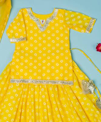 yellow bandhej lehenga for girls 2