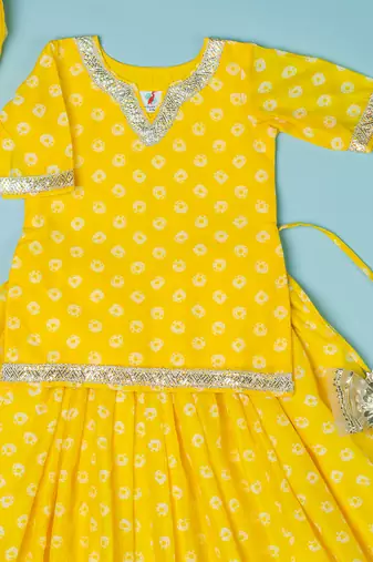 yellow bandhej lehenga for girls