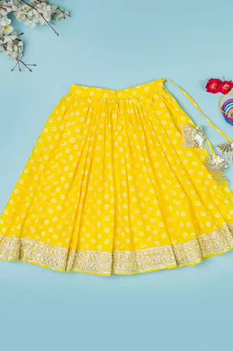 yellow bandhej lehenga for girls