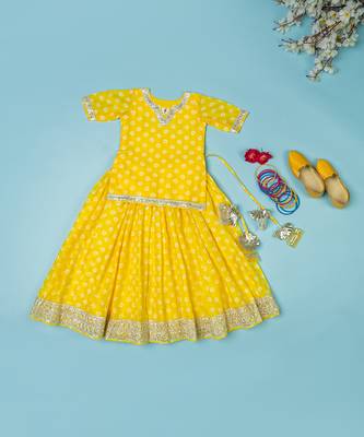 yellow bandhej lehenga for girls 4