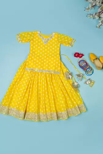 yellow bandhej lehenga for girls