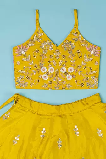 Golden yellow pure spun lehenga set for girls.