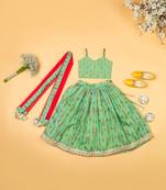 Green chanderi fiaired lehenga set for girls