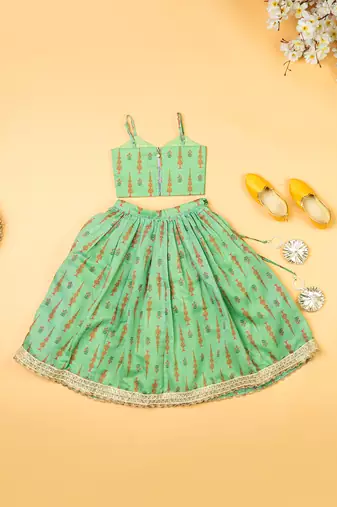Green chanderi fiaired lehenga set for girls