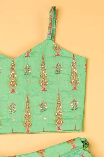 Green chanderi fiaired lehenga set for girls