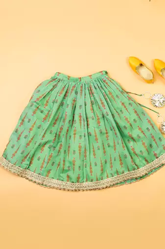 Green chanderi fiaired lehenga set for girls