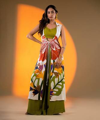 Off-white sleeveless kurta set with floral embroidery & green flared pants 1