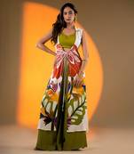 Off-white sleeveless kurta set with floral embroidery & green flared pants