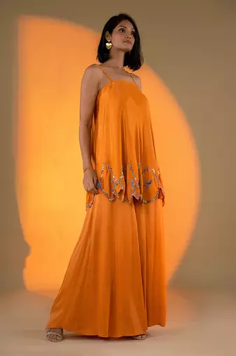Rust orange sleeveless kurta set with embroidery & sharara