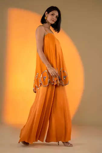 Rust orange sleeveless kurta set with embroidery & sharara