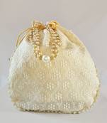 Cream luxurious traditional indian silk round potli bag