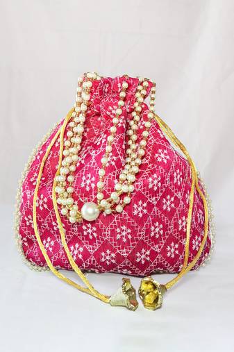 Maroon luxurious traditional indian silk round potli bag