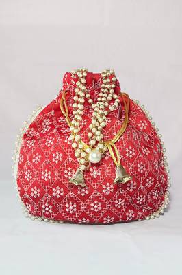 Red luxurious traditional indian silk round potli bag 1