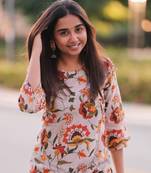 Women's Floral Printed Knee Length Round Neck Kurta And Pant Set (Beige)