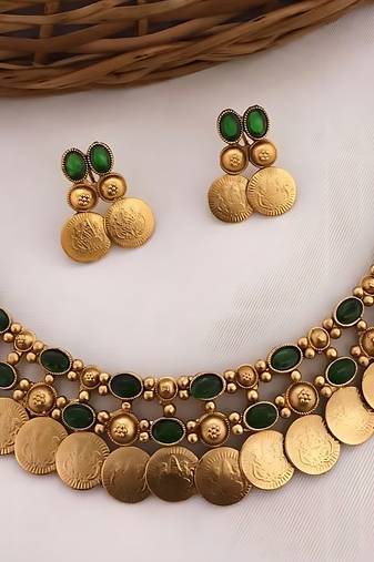 Gold-tone coin necklace set with emerald and ruby gemstones