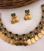 Gold-tone coin necklace set with emerald and ruby gemstones