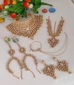 White kundan bridal jewelry set with pearl drops complete wedding collection