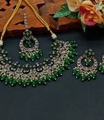 Elegant green and gold indian jewelry set - necklace, earrings, and maang tikka
