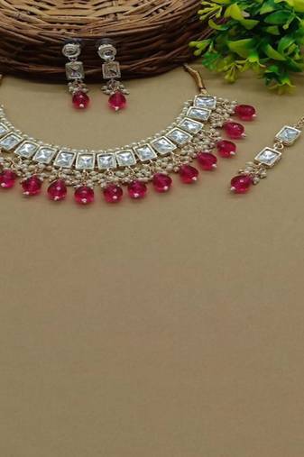 elegant kundan choker set with garnet drops and matching earrings & tikka