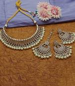 Exquisite pearl-adorned indian choker necklace and earrings set