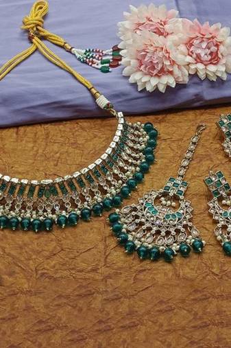 Exquisite pearl-adorned indian choker necklace and earrings set