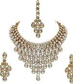 Luxurious gold-plated kundan choker necklace set with maang tikka and earrings