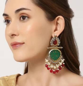 Elegant kundan-inspired chandelier earrings with red and green gemstones 1