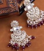 Exquisite kundan-inspired chandelier earrings with pearl and ruby accents