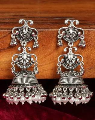 Vintage oxidized silver jhumka earrings with pearl and red bead accents 1