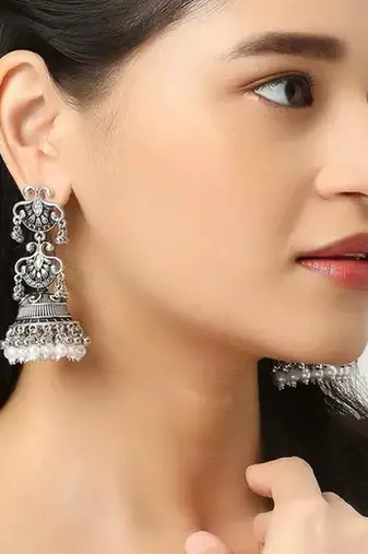 Vintage oxidized silver jhumka earrings with pearl and red bead accents