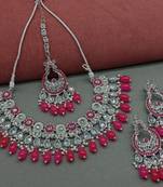Elegant magenta and silver indian bridal jewelry set with kundan and beads