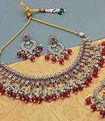 Regal red kundan bridal set with crystal and pearl accents - luxurious indian wedding jewelry