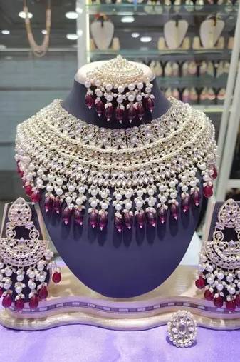 Opulent bridal kundan choker set with wine beads and matching earrings & maang tikka